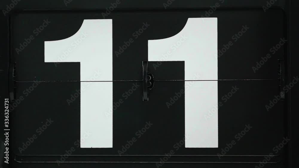 Close-up Flip clock Change Date numbers from 10 to 11, Time concept.