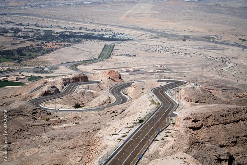 aerial view of highway in mountains