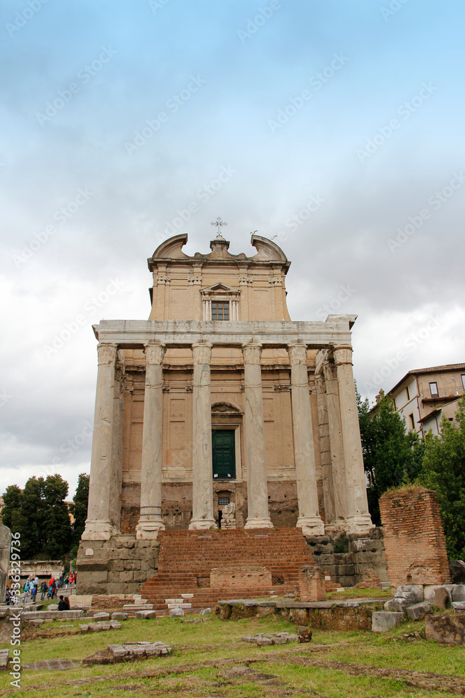 Temple of Antoninus and Faustina during sunset in Roman Forum, Rome, Italy