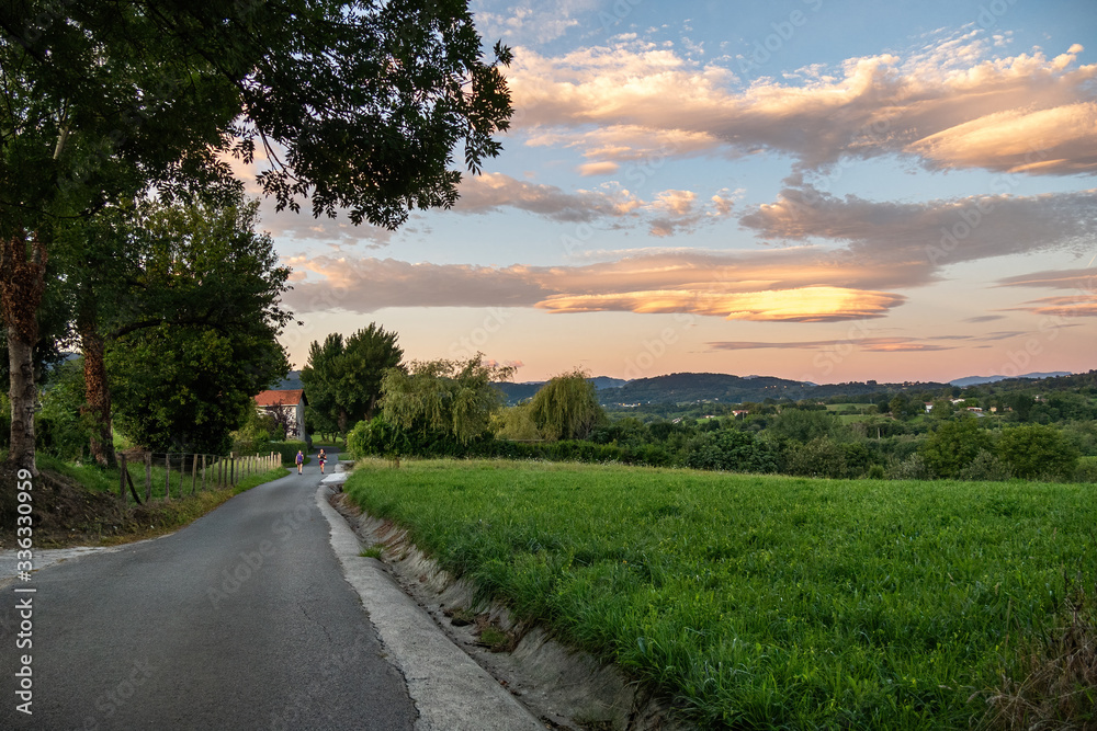 Amazing colorful lenticular clouds over mountain in countryside at the walking route. Irun, Basque Country, Spain. Camino de Santiago