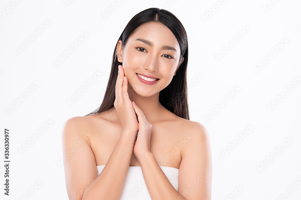 Beautiful Young Asian Woman with Clean Fresh Skin. Face care, Facial treatment, Cosmetology, beauty and healthy skin and cosmetic concept, woman beauty skin isolated on white background Beautiful Young Asian Woman with Clean Fresh Skin. Face care, Facial treatment, Cosmetology, beauty and healthy skin and cosmetic concept, woman beauty skin isolated on white background