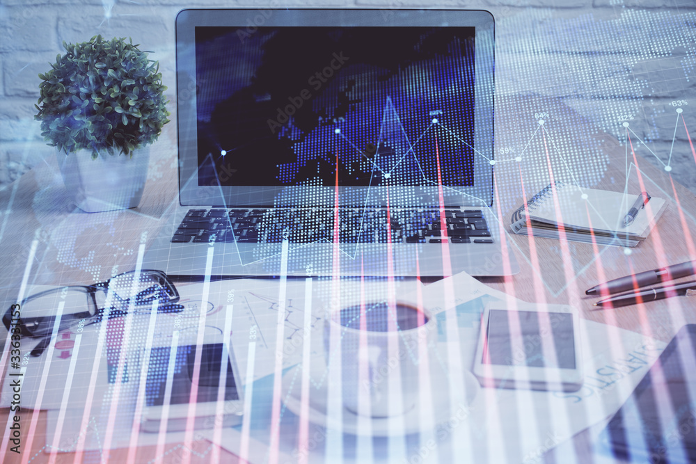 Forex market chart hologram and personal computer background. Double exposure. Concept of investment. Forex market chart hologram and personal computer background. Double exposure. Concept of investment.