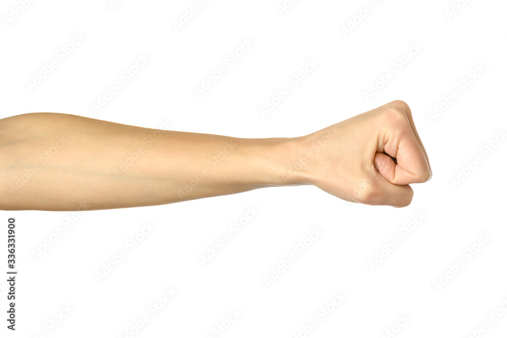 Hand clenched in a fist. Woman hand gesturing isolated on white