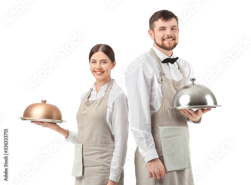 Portrait of waiters on whit...