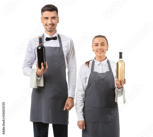 Portrait of waiters on whit...