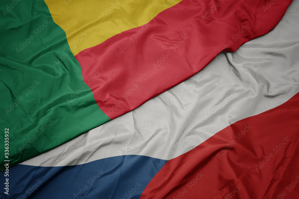 waving colorful flag of czech republic and national flag of benin.