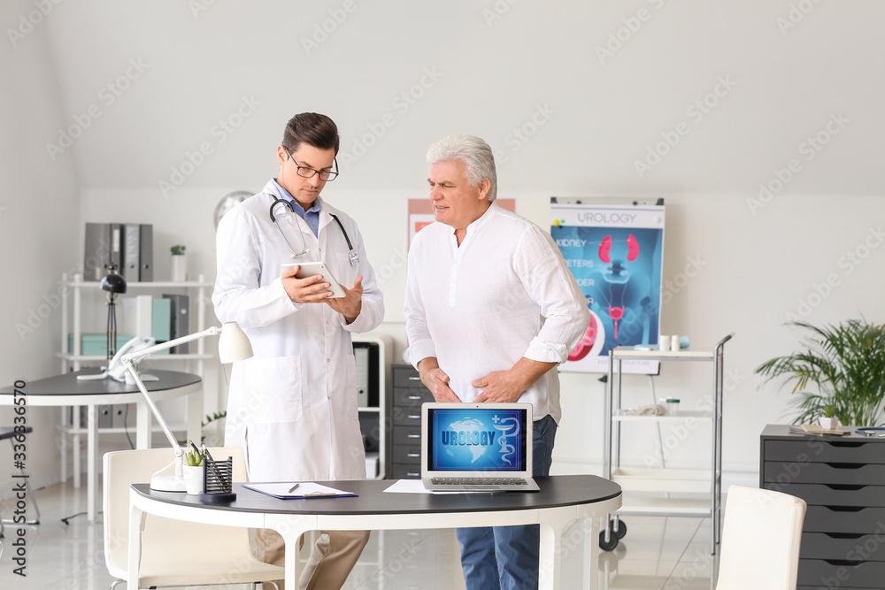 Senior man visiting urologist in clinic Senior man visiting urologist in clinic