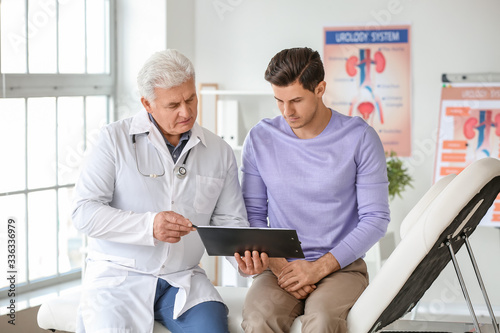 Young man visiting urologis...