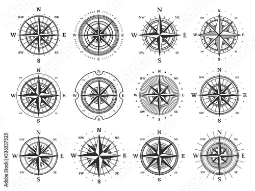 Nautical compass wind rose vector icons. Isolated vintage symbols of marine maps and antique cartography, navigation compass rose or windrose with cardinal directions of North, East, South and West photo