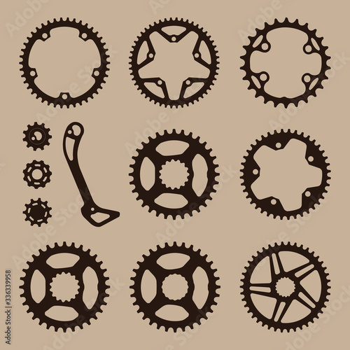 Bicycle gear cogwheel sprocket symbols chainwheel collection. Vector set of bike chainring silhouettes (chainwheel, sprockets) isolated. Bike pedal and elements for cycle biking, vector illustration.