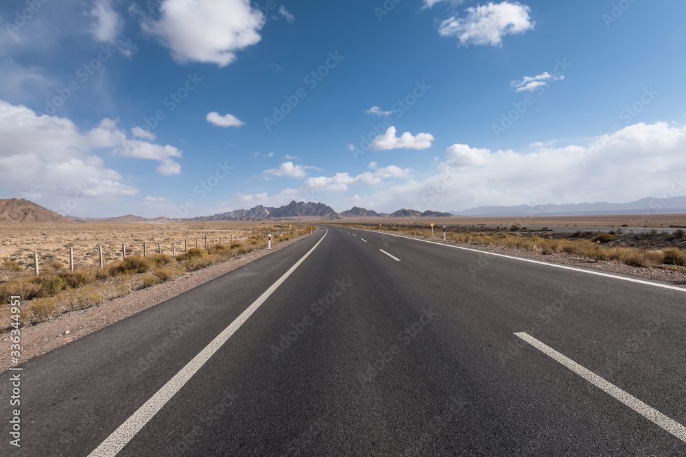 Gobi desert road on vast dry wilderness