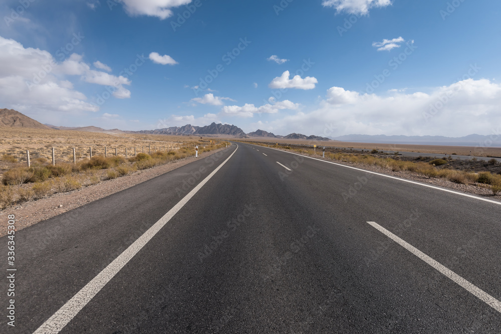 Gobi desert road on vast dry wilderness