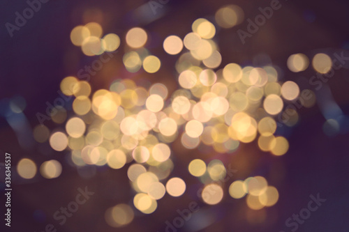 Background of defocused bokeh lights different colors. It can be used as a background, the basis for postcards, as a blank for text.