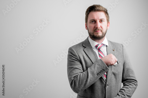 Portrait of business man wearing business clothes take out the card pocket