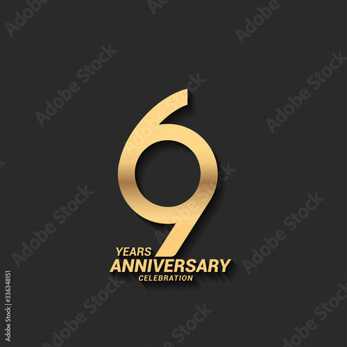 69 years anniversary celebration logotype with elegant modern number gold color for celebration photo