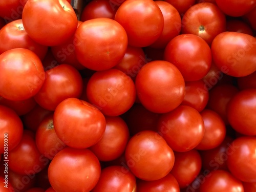 red tomatoes a daily use vegetable in market 