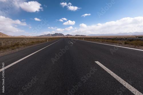 Gobi desert road on vast dry wilderness