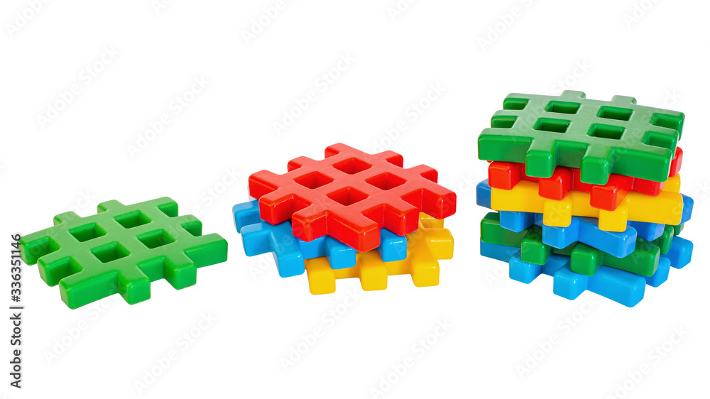Fototapeta premium Multicolored toy blocks isolated on white background.