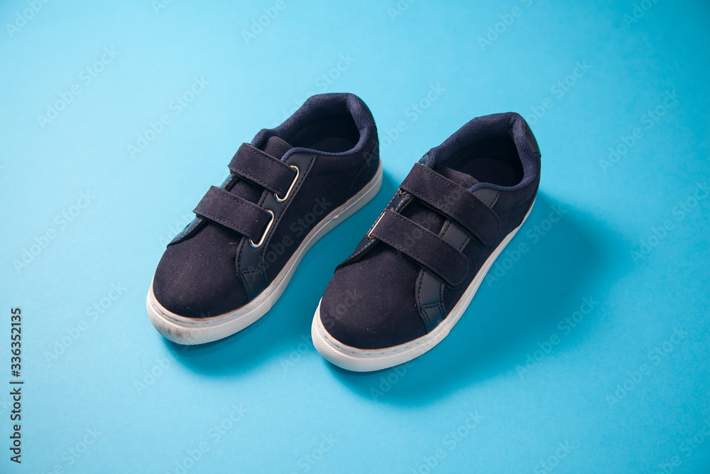 Naklejka premium Gray cute pare of baby boy sneakers