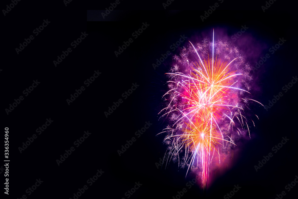 Beautiful firework display for celebration happy new year and merry christmas on isolated black background Beautiful firework display for celebration happy new year and merry christmas on isolated black background