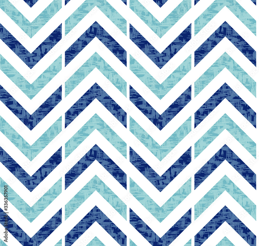 Abstract grunge chevron Ikat geometric seamless pattern. Blue zigzag waves on white background. Ethnic asian, indian, aztec fashion style. Fancy boho texture for fabric print, wallpaper, gift wrap. Abstract grunge chevron Ikat geometric seamless pattern. Blue zigzag waves on white background. Ethnic asian, indian, aztec fashion style. Fancy boho texture for fabric print, wallpaper, gift wrap.
