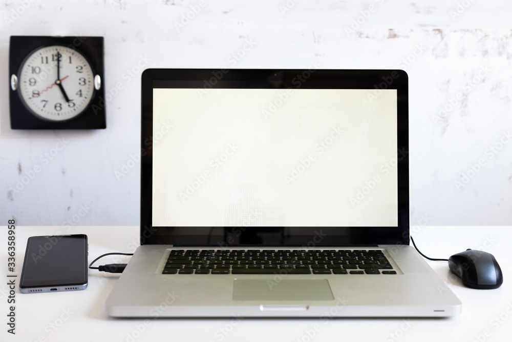 laptop with mouse and clock laptop with mouse and clock