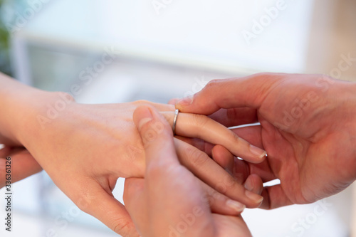 wedding rings on hands