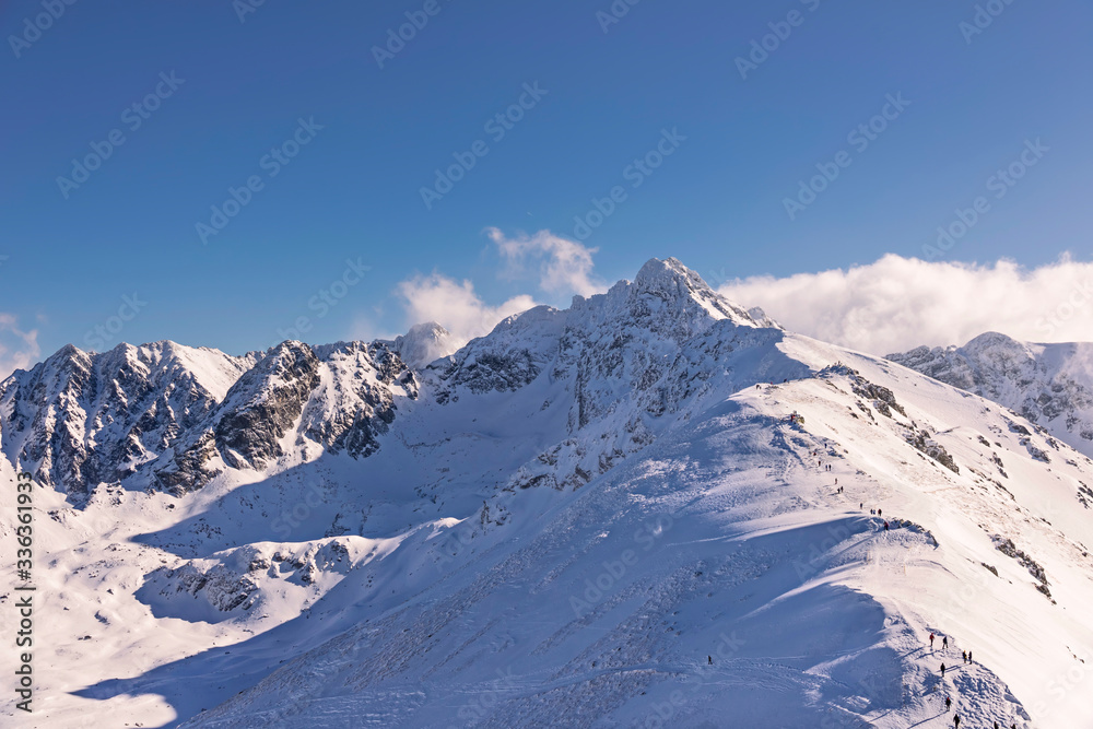 Ski resort in Poland. High mountain Tatras. Peak Kasprowy near Zakopane. Winter time. Beautiful landscape.