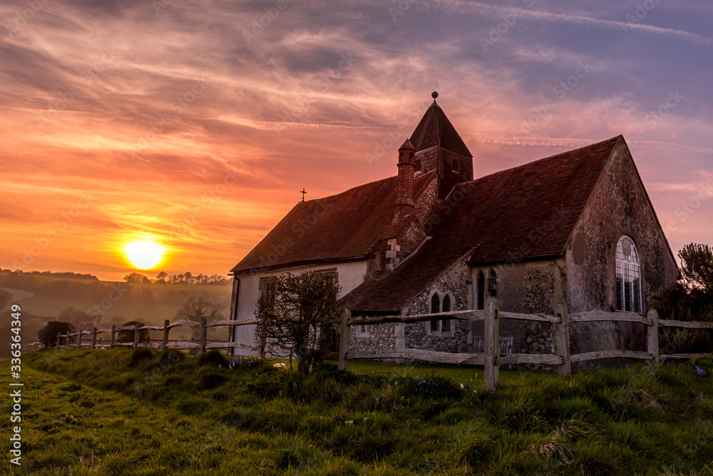 Sunset at the Isolated St Hubert's Church, South Downs National Park, Hampshire, UK
