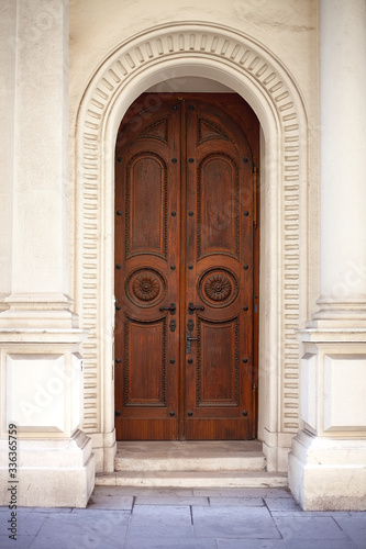 Antique wooden door with beautiful decor.