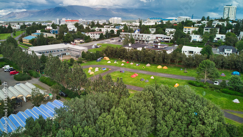 Aerial view of Reykjavik. Sports area with swimming pools, camping sites, footballs, caravans and hostels. Views of the mountains and the bay © JavierBallesterLegua