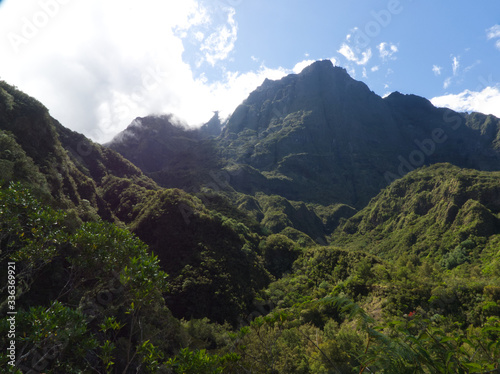 Scenic viewpoint in Mafate with steep mountains in Reunion Island