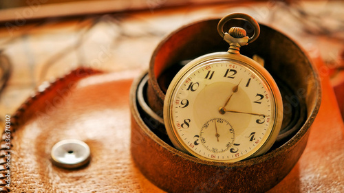 Open-face pocket watch photo background