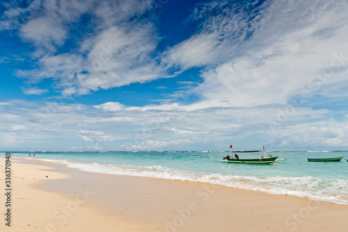 A fishing boat anchored in a deserted lagoon in Bali, Indonesia. © leo_nik