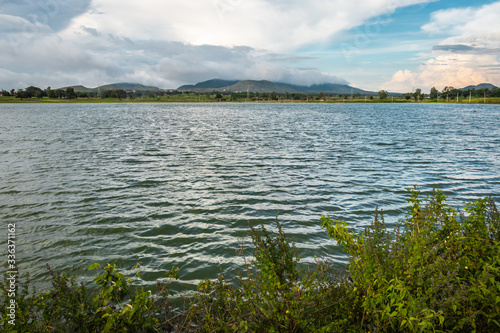 beautiful lake with mountain and amazing sky background