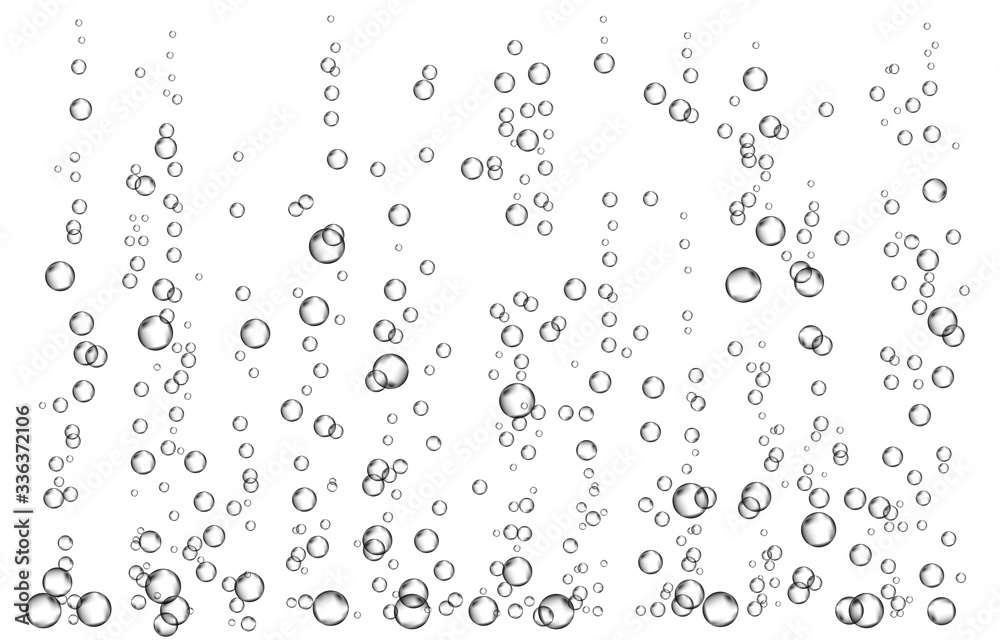 Fototapeta premium Black fizzing air bubbles in water on white background. .
