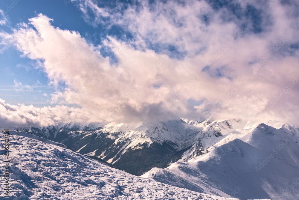 Fototapeta premium Ski resort in Poland. High mountain Tatras. Peak Kasprowy near Zakopane. Winter time. Beautiful landscape.