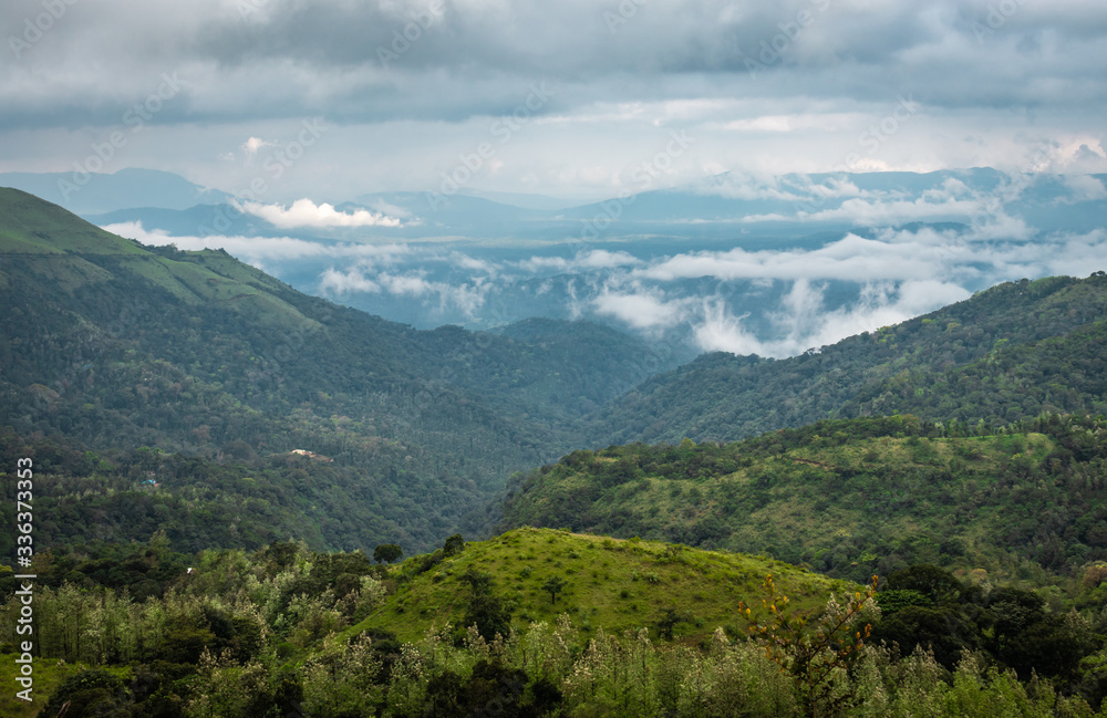 Fototapeta premium mountain coverd with cloud layers and beautiful sky