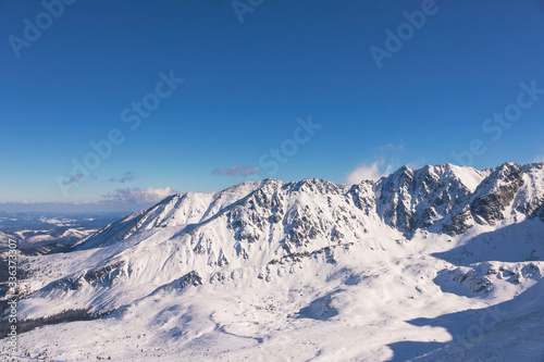 Ski resort in Poland. High mountain Tatras. Peak Kasprowy near Zakopane. Winter time. Beautiful landscape. © Marcin Chodorowski