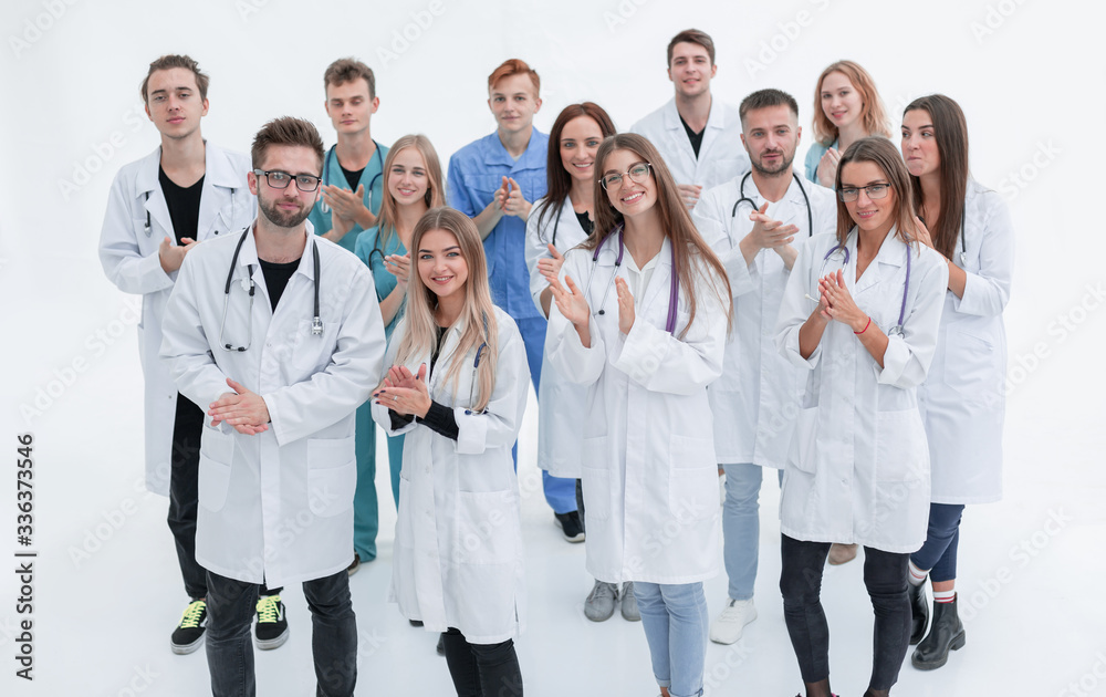 close up. hospital doctors applauding their success. close up. hospital doctors applauding their success.