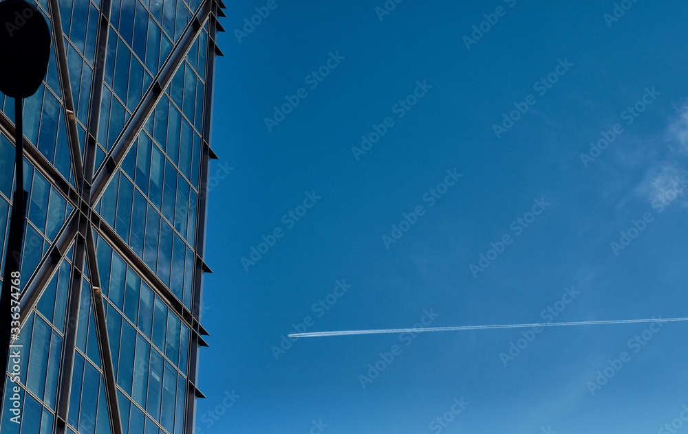 Modern building and plane in London Modern building and plane in London