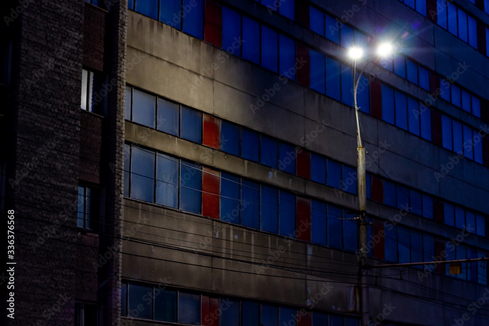 Saratov / Russia. street light on factory windows. Saratov / Russia. street light on factory windows.