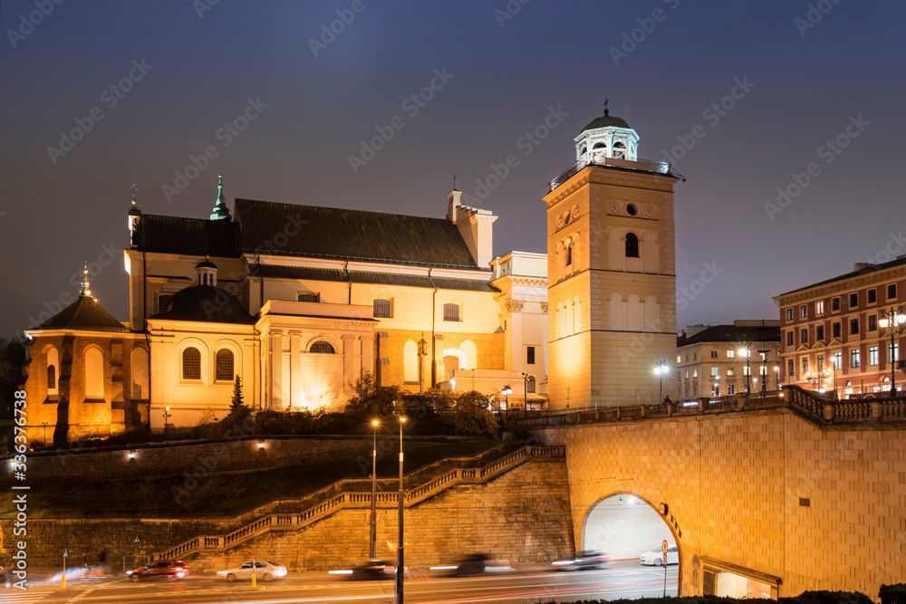 View of old town in Warsaw with St. Anne's Church . Capital of Poland.