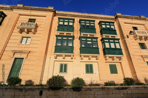 Fotografija Exterior view of newly renovated residential houses located on top of the fortif