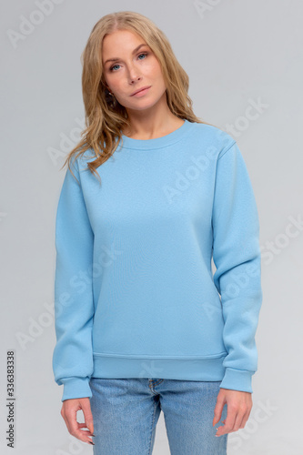 Blank sweatshirt mock up isolated. Female wear plain hoodie mockup. Plain hoody design presentation. Clear loose overall model. Pullover for print. Woman clothes sweat shirt template sweater wearing