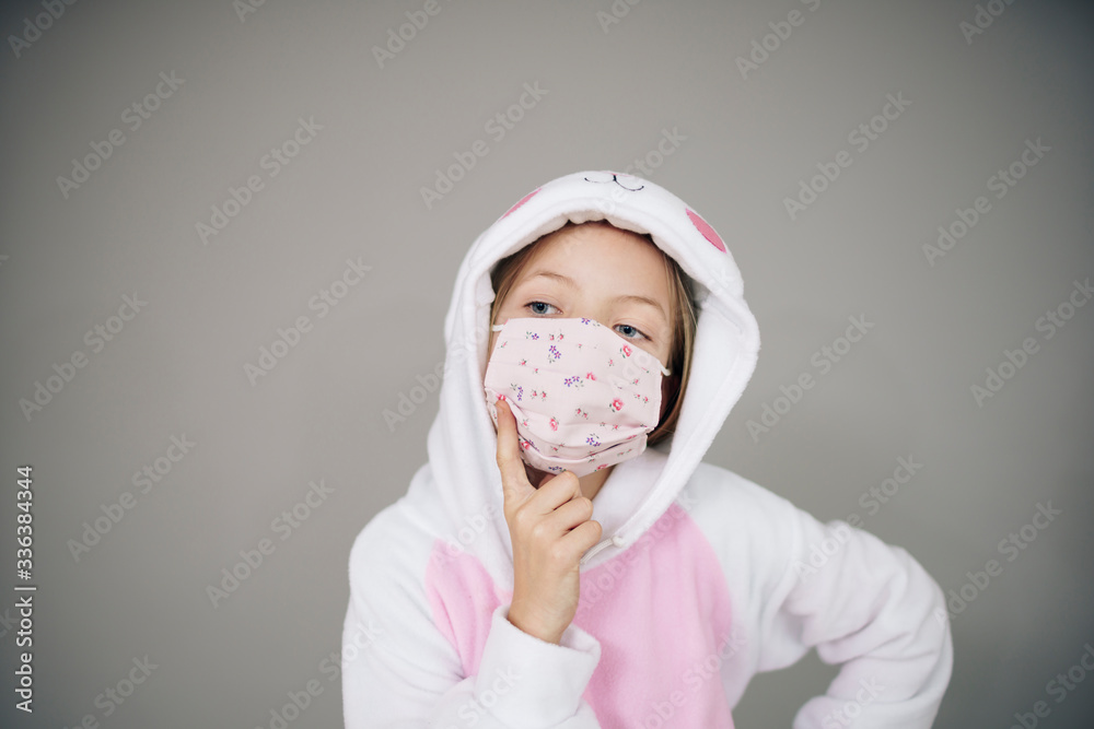 beautiful girl dressed as easter bunny rabbit with face protective mask during the corona corvid 19 lockdown beautiful girl dressed as easter bunny rabbit with face protective mask during the corona corvid 19 lockdown