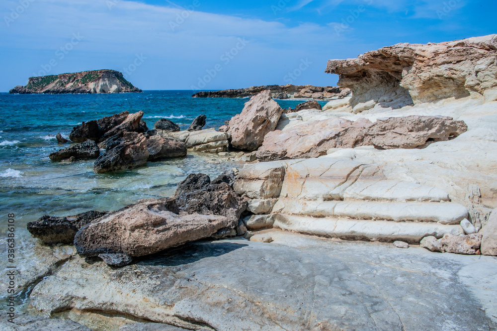 Cape Drepano on the west coast of Cyprus is an amazing natural phenomenon. Sea waves expose a white layered rock that takes on bizarre shapes. Cape Drepano on the west coast of Cyprus is an amazing natural phenomenon. Sea waves expose a white layered rock that takes on bizarre shapes.