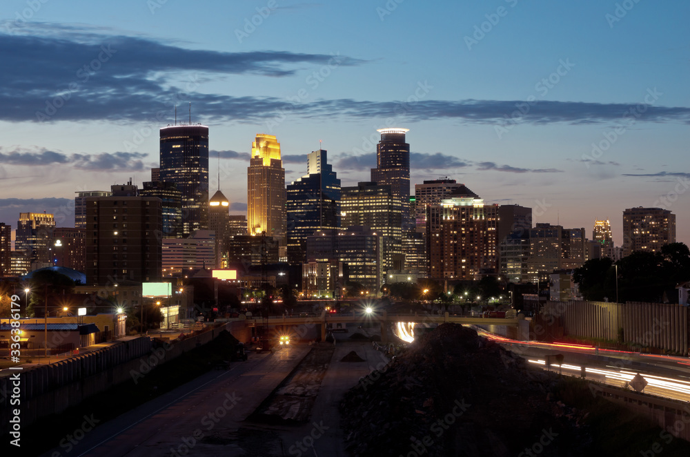 Minneapolis skyline and freeway at night