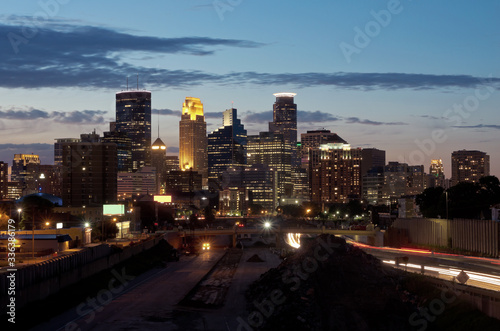 Minneapolis skyline and freeway at night