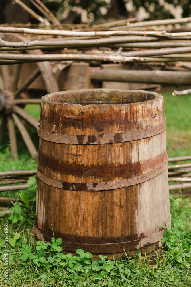 water barrels in the garden on the grass. water barrels in the garden on the grass.